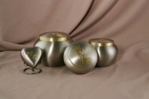 Photo of Pewter Bronze Double Paw Ensemble Pet Urn from Hindman Funeral Homes, Inc.