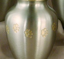 Pewter Classic with Brass Paw Pet Urn from Hindman Funeral Homes, Inc.