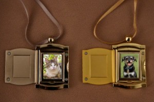 Photo of Pet Photo Frame Pendants Gold and Silver Pet Urn from Hindman Funeral Homes, Inc.